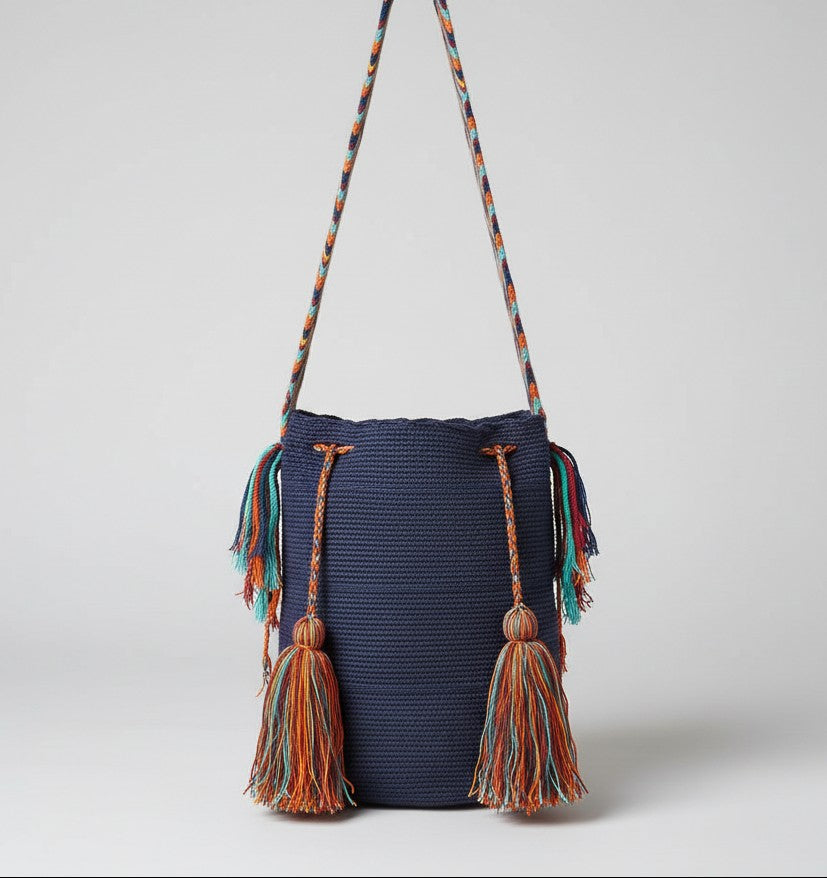 Authentic handmade Colombian Wayuu Mochila in blue cotton thread, colourful tassels and crossbody strap. Ethically and responsibly sourced.