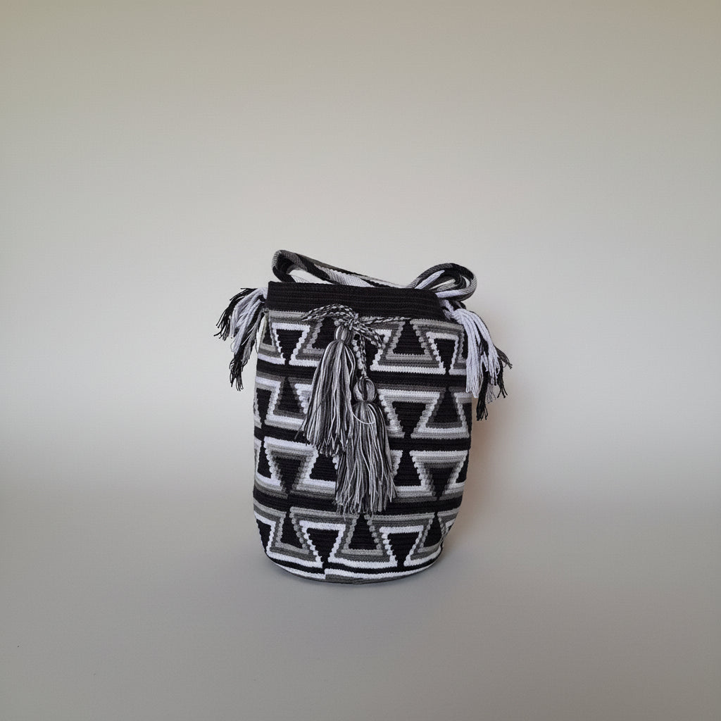 Authentic handmade Colombian Wayuu Mochila in vibrant cotton threads, geometric design. Ethically and responsibly sourced.