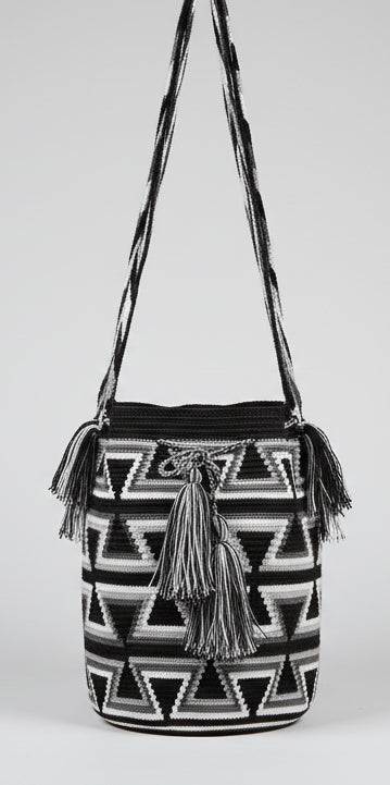 Authentic handmade Colombian Wayuu Mochila in vibrant cotton threads, geometric design black and white. Ethically and responsibly sourced.