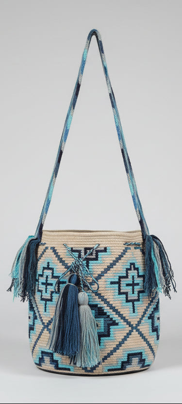 Authentic handmade Colombian Wayuu Mochila in vibrant cotton threads, geometric design in blues and white. Ethically and responsibly sourced.
