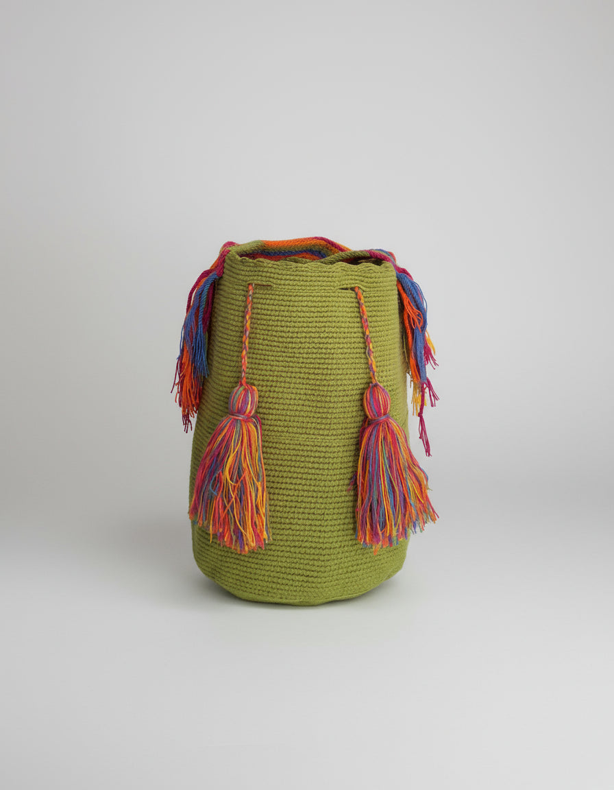 Authentic handmade Colombian Wayuu Mochila in bright green cotton thread. Large artisanal bag is supports indigenous weavers with every boho purchase