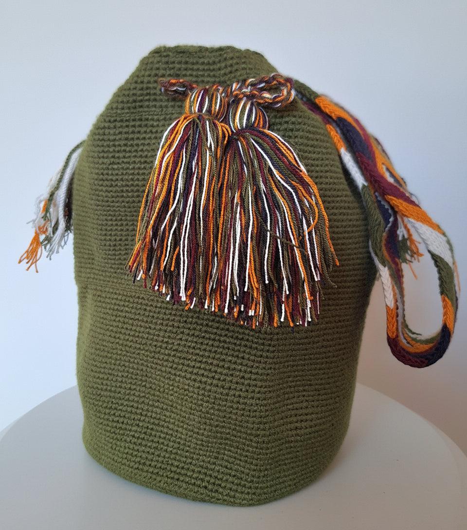 Authentic handmade Colombian Wayuu Mochila in vibrant cotton threads in olive green. Large bag is authentic Wayuu heritage, ideal for eclectic outfits.