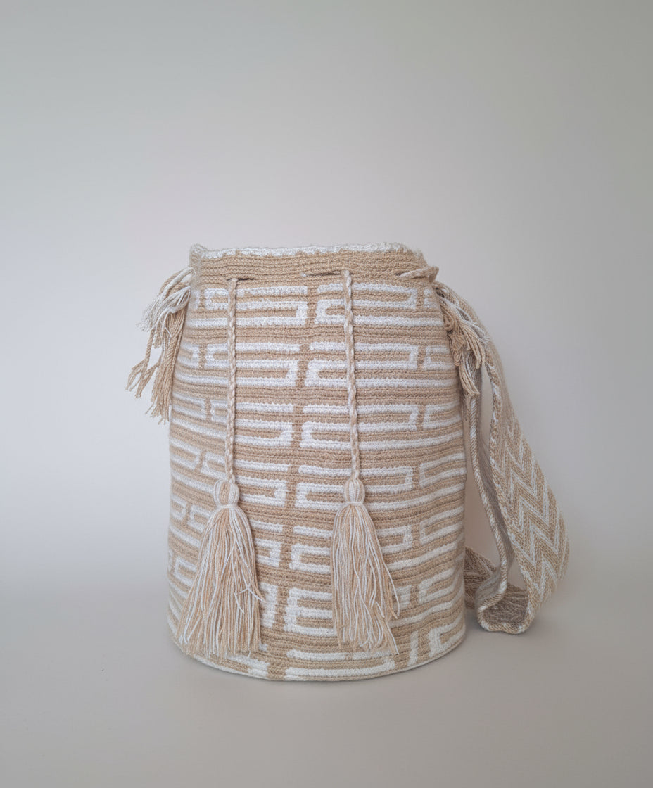 Authentic handmade Colombian Wayuu Mochila in vibrant cotton threads, unique design. Large artisanal bag supports indigenous weavers with every boho purchase.