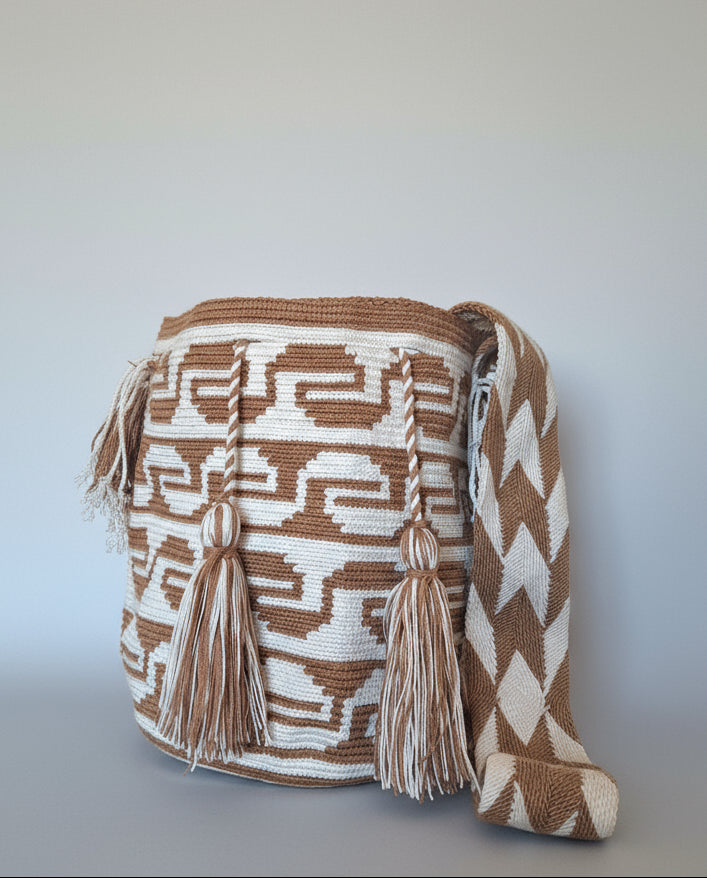 Authentic handmade Colombian Wayuu Mochila in beige and white cotton threads, one of a kind design. Ethically and responsibly sourced.