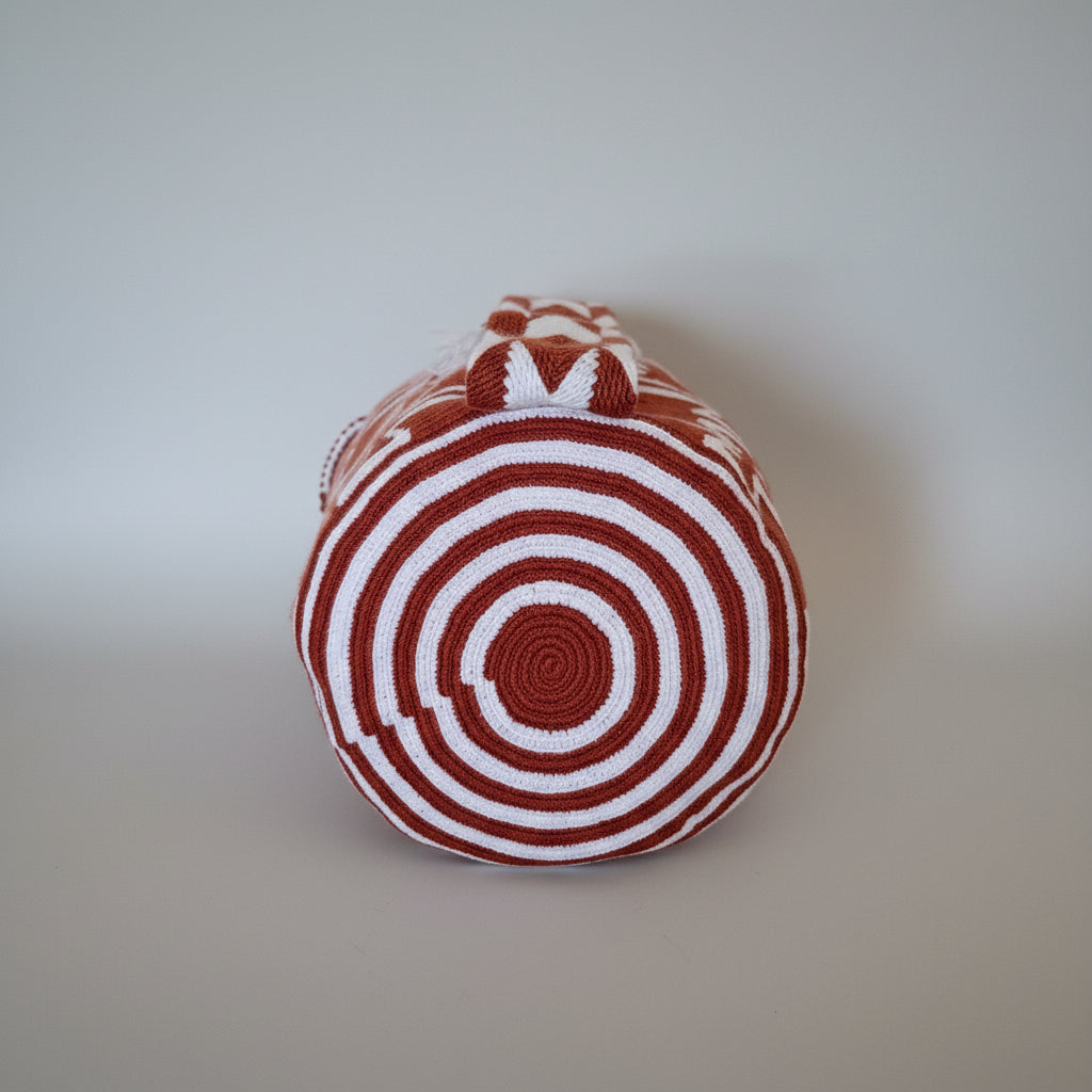 Under view of base of red and white Wayuu mochila bag. Fairtrade applied for perfect festival bag