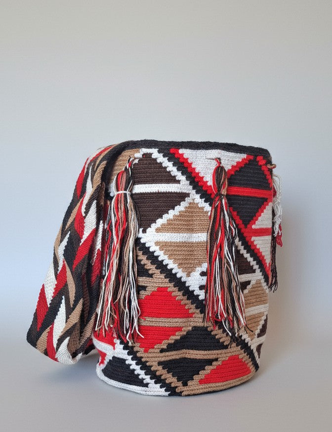 Authentic handmade Colombian Wayuu Mochila in brown, beige and red cotton threads, with geometric diamond design. Ethically and responsibly sourced.