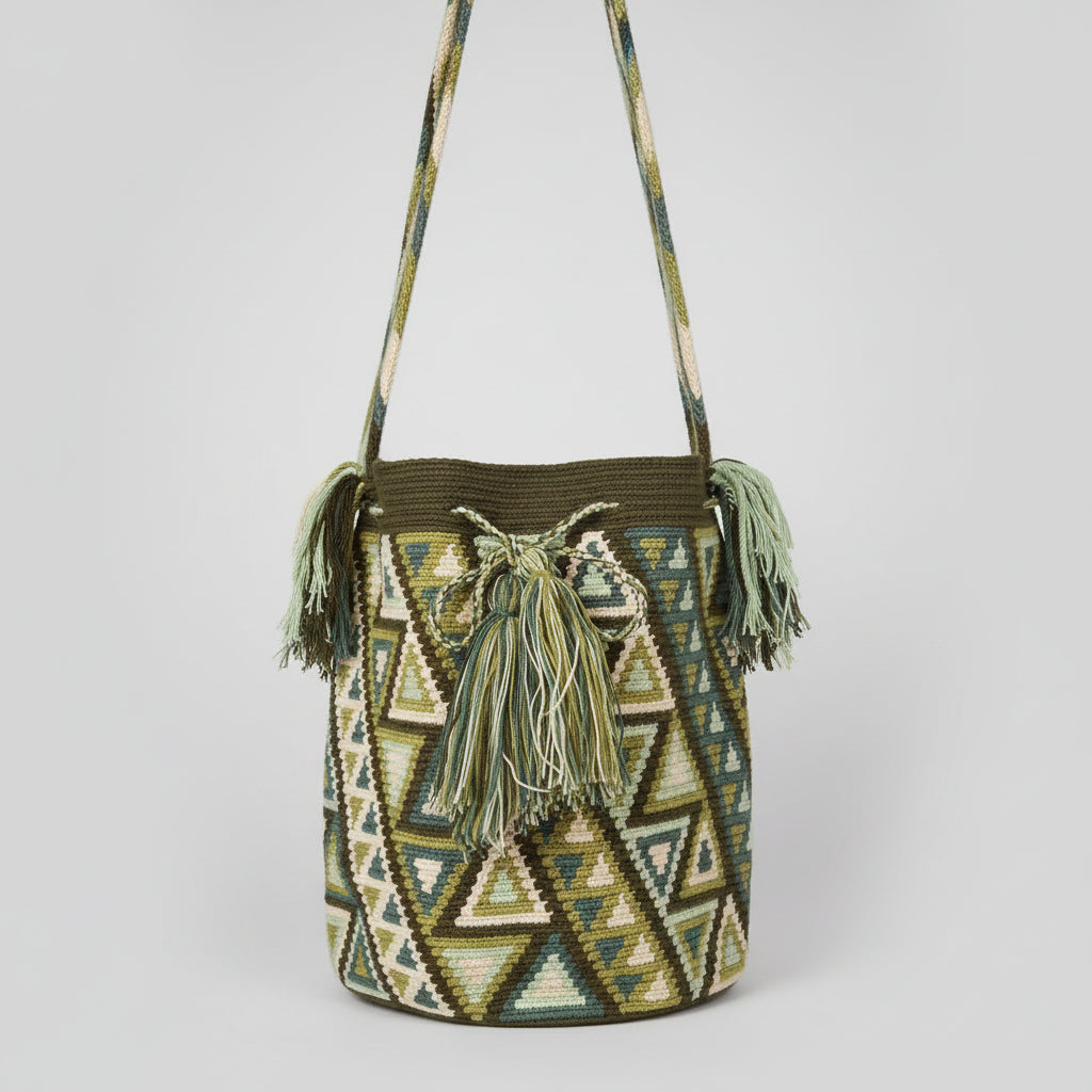 Authentic handmade Colombian Wayuu Mochila in vibrant cotton design in green and white. Ethically and responsibly sourced.
