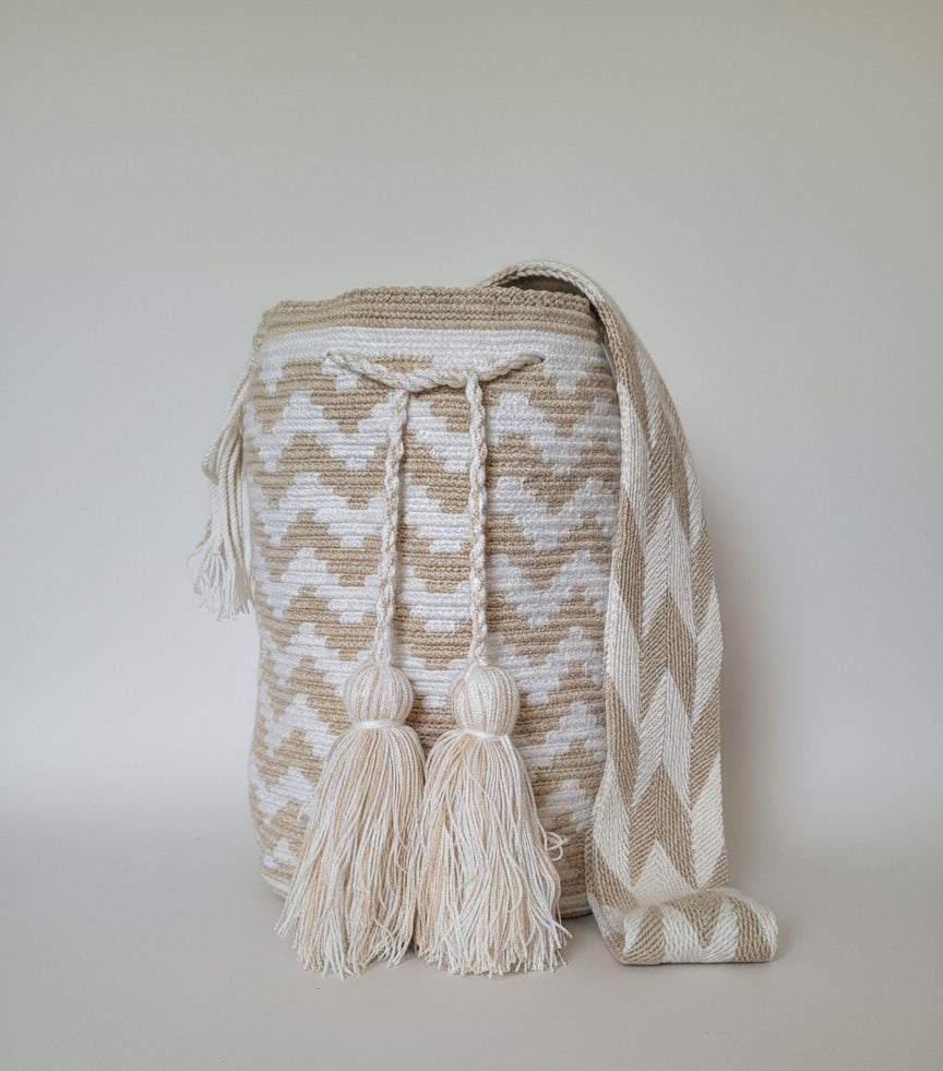 Authentic handmade Colombian Wayuu Mochila in soft toned cotton threads, zigzag design. Ethically and responsibly sourced.